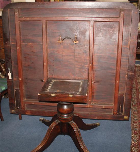 An early 19th century mahogany extending twin pillar dining table, Extended 10ft x 4ft 9.5in. x 1ft 1.5in.